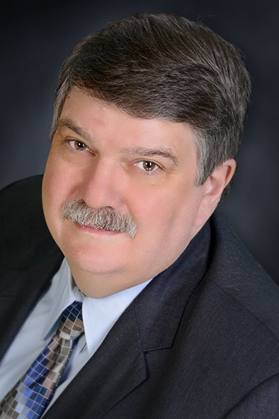 Dr. Larry Sangrik